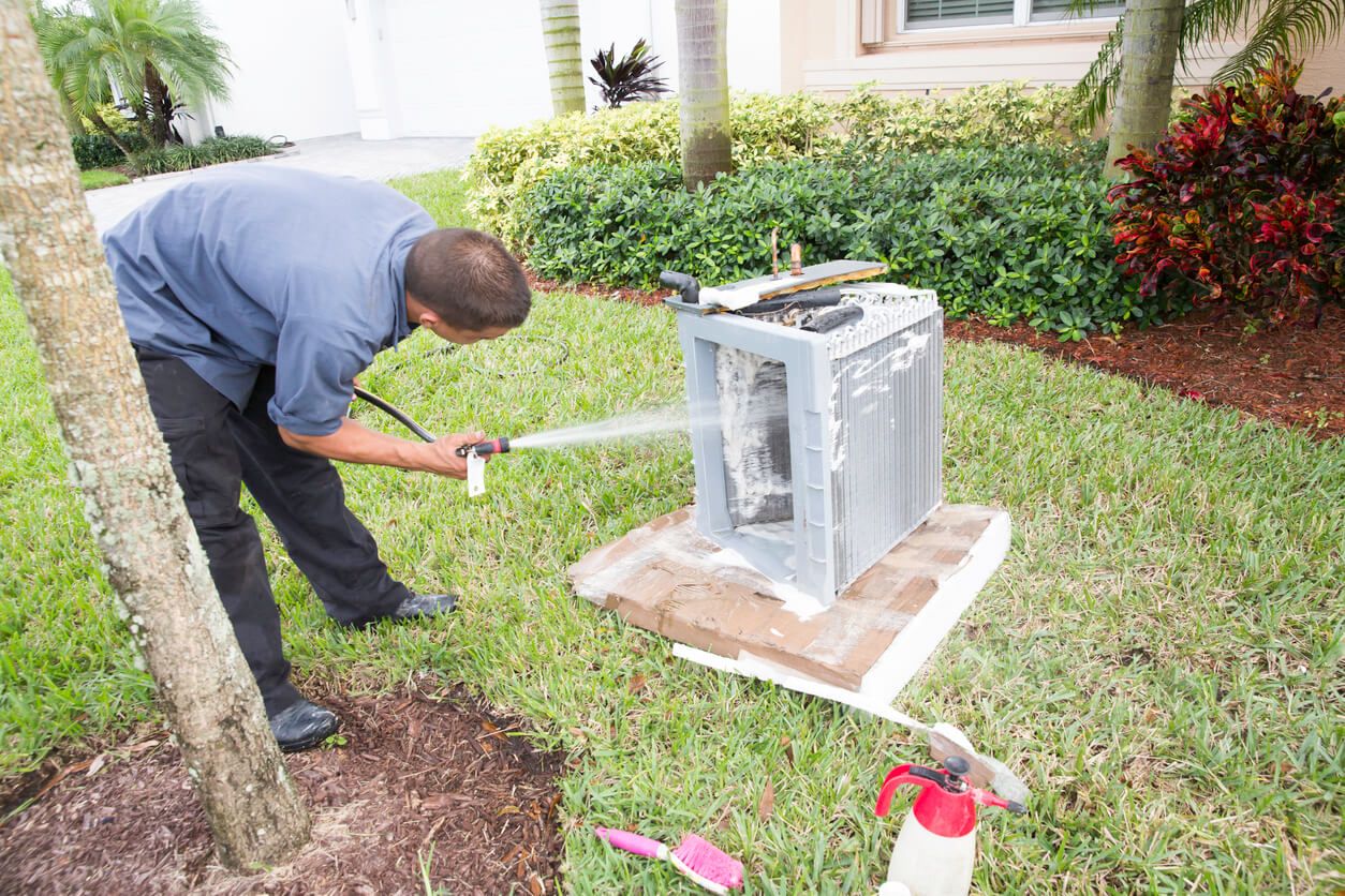 air conditioner ac washing drain coils repairman acid mold istock clogs keep ways stop prepare spring fresh conditioning outside
