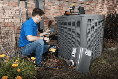 Technician Checking Outdoor AC Unit